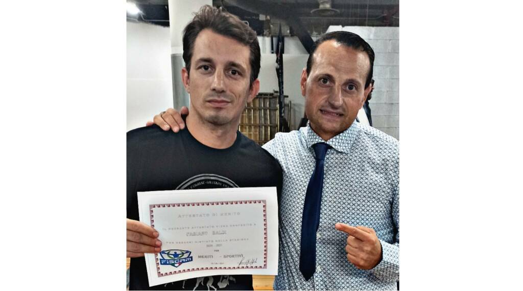 Attestato di merito sportivo anno 2021 per il coach della Fight Team School di Asti Fabiano Baldi